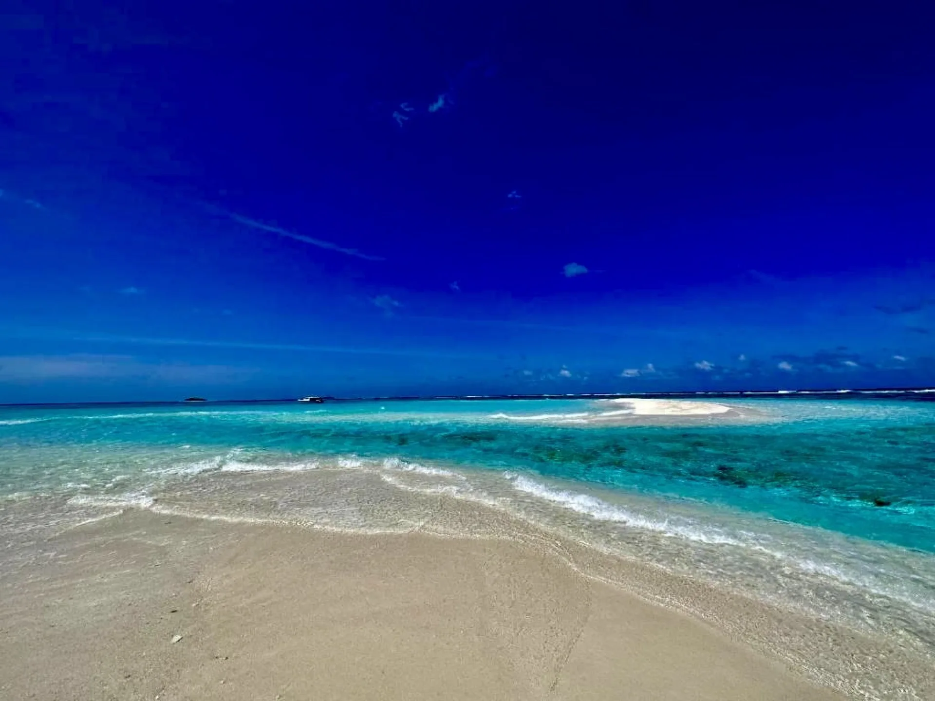 Caribbean water off a white sand shore in Jamaica